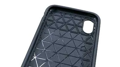Angled view of a black phone case interior, showing interlocking geometric triangles and a camera cutout.