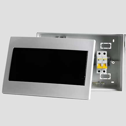 Plastic distribution board. Electrical board. Close-up. Isolated on light gray background.